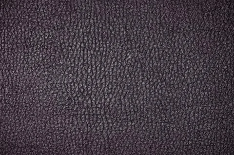 Dark leather texture closeup to use as background Stock Photos