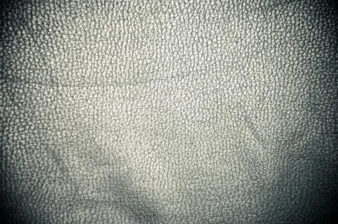 Dark leather texture closeup to use as background Stock Photos