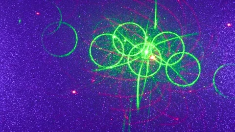 On a dark lilac and blue gradient background, flying animated changing patterns Stock Footage 241292977