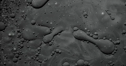 Dark liquid pattern with bubbles, flowing shapes, and cinematic abstract texture Stock Footage 345028609