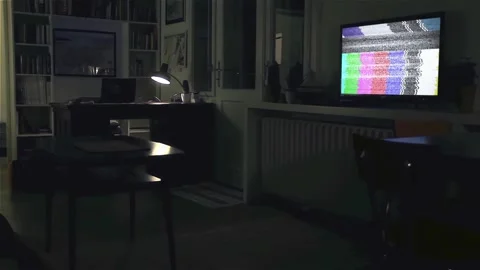Dark Living Room Night Interior with Television Turning On to Green Screen - 4K Stock Footage 337183375