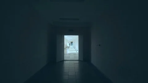 Dark long corridor with a bed in the hospital. Stock Footage 80418085