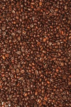 Dark many roasted coffee beans texture background Stock Photos