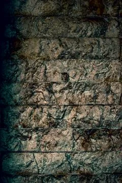 Dark marble panel wall with vertical segmentation and green-gray hues, Stock Photos