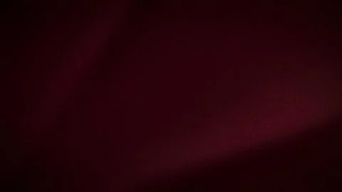 Dark maroon grainy abstract background with smooth gradient and subtle blur.. Stock Photos