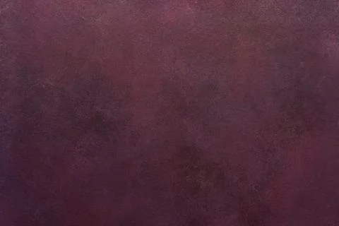 A dark maroon surface exhibits a subtle texture. Light and dark variations .. Foto stock