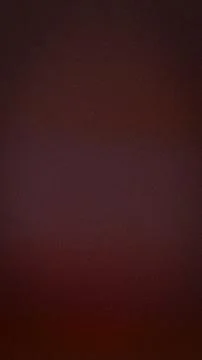 A dark maroon textured background featuring a subtle gradient of reddish brow Stock Illustration