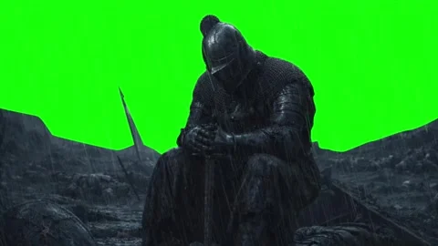 Dark Medieval Knight Sitting in Rain on Battlefield Cinematic Scene On Green Stock Footage 332970228