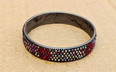 Dark metal bangle with crystals 스톡 사진
