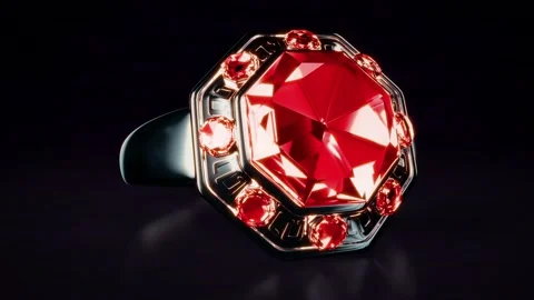 Dark metal ring with red ruby jewel rotates, isolated, fictitious Stock Footage 184608826