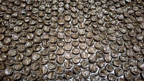 Dark Metallic Bubble Wrap Close-Up Texture for Packaging or Background Stock Photos