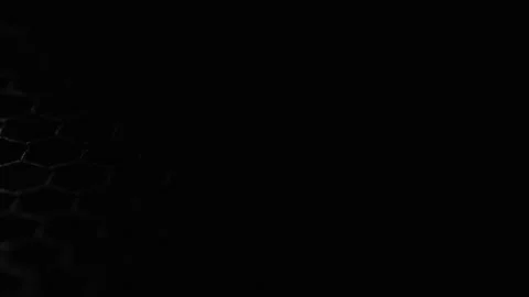 Dark metallic hexagonal grid with dramatic lighting Stock Footage 303822239