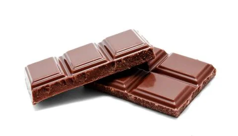 Dark milk chocolate bars stack isolated on a white Stock Photos