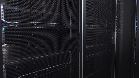 Dark modern working data servers with flashing LED green lights. Video stock 109422932