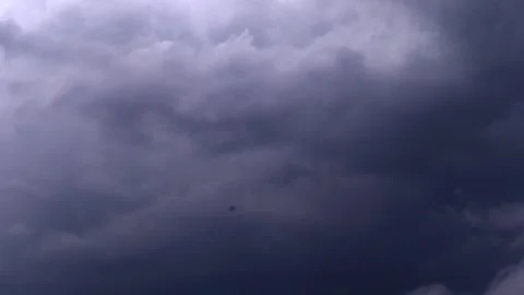 Dark monsoon storm clouds covering the sky before heavy rainfall Video stock 336532857