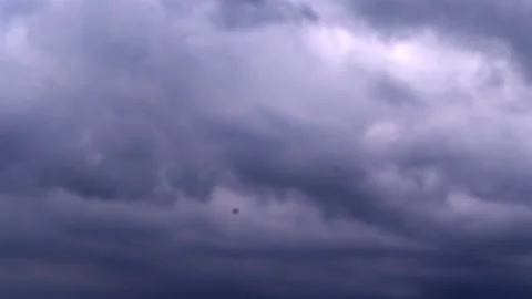 Dark monsoon storm clouds gathering in the sky before rainfall Stock Footage 336532915