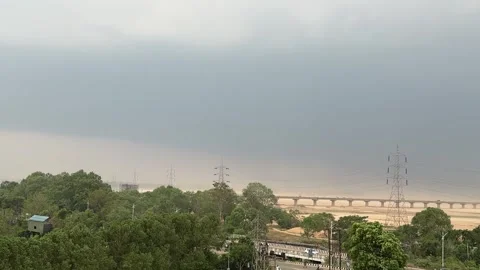 Dark Monsoon Storm Clouds Over Kathajodi River Bridge Viewed from Cuttack Stock Footage 338041022