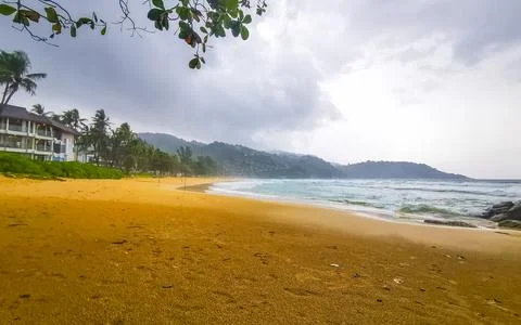 Dark monsoon storm clouds over Kata Noi Beach Thailand Stock Photos