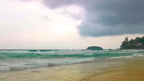 Dark monsoon storm clouds rain over Kata Noi Beach Thailand Stock Footage 346136266