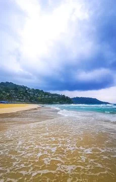 Dark monsoon storm clouds rain over Kata Noi Beach Thailand Stock Photos