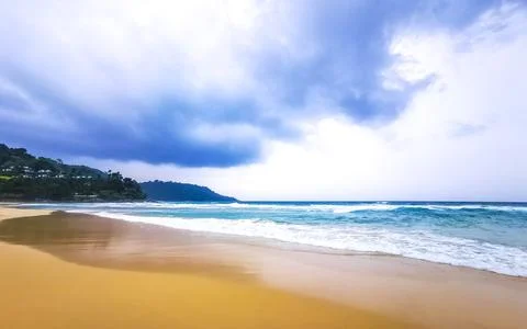 Dark monsoon storm clouds rain over Kata Noi Beach Thailand Stock Photos