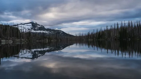 Dark moody clouds over mountain lake Stock Footage 167118636