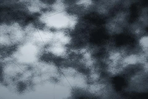 Dark moody monochrome backdrop with soft glowing clouds and sharp scratched.. Stock Photos