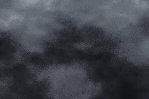 Dark moody storm clouds texture with subtle scratches for cinematic horror .. Stock Photos