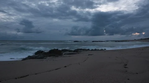 Dark moody time lapse at dusk as night falls over ocean Stock Footage 109267560
