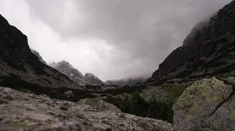 Dark Mountain Peaks Clouds Timelapse 4K Stock Footage 66561026