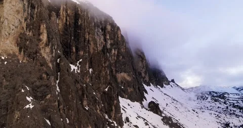 Dark Mountain side Aerial view. Sella mountain after the rain in the Dolomites Stock Footage 132111963