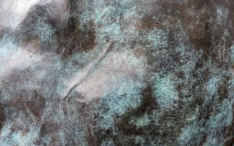 A dark mountainous surface in close-up with daylight Stock Photos