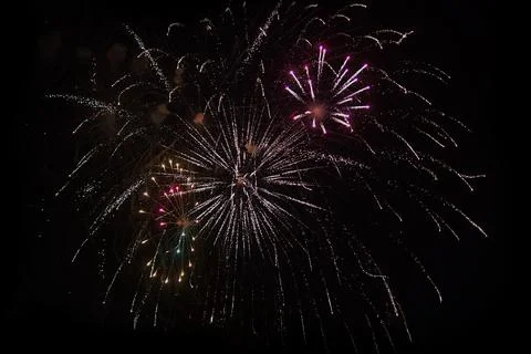 Dark Multi-Colored Fireworks Stock Photos