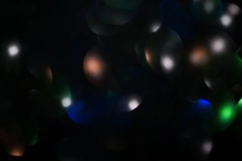 Dark multicolored bokeh. Stock Photos