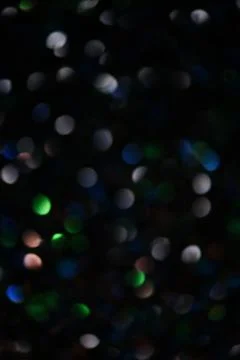 Dark multicolored bokeh. Stock Photos