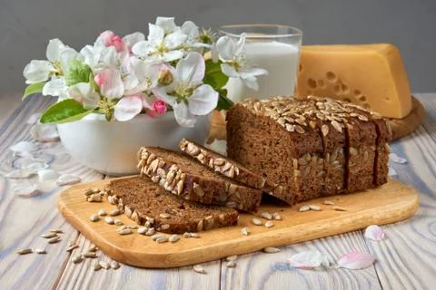 Dark multigrain bread made from rye, wheat, oats and barley with sunflower an Stock Photos