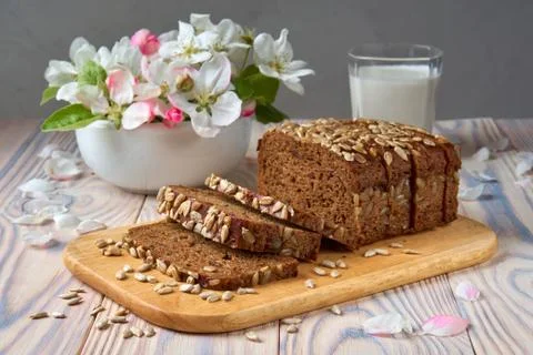 Dark multigrain bread made from rye, wheat, oats and barley with sunflower an Stock Photos