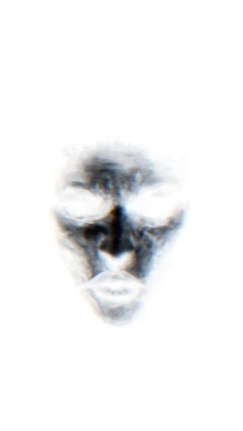 Dark mysterious ghostly face emerging from white background with a haunting. Stock Footage 318206343