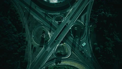 Dark night intersection, aerial spin hyperlapse. Traffic on highway junction Stock Footage 138086552