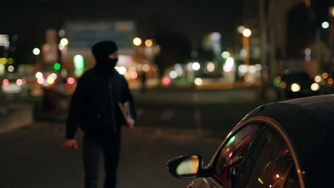 At dark night robber checking use laptop breaking entering alarm shines a Vídeos de archivo 110889002