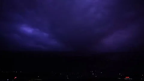 In the dark night, thunder and lightning flashing over the city Stock Footage 152497660