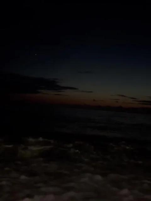 Dark Ocean Waves at Twilight Under a Night Sky Video stock 341318401