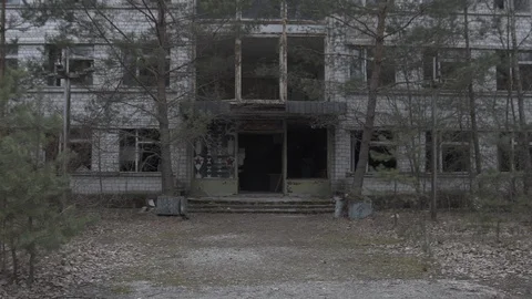 Dark old building left by people after Chernobyl nuclear catastrophe in 1986 Stock Footage 109624261