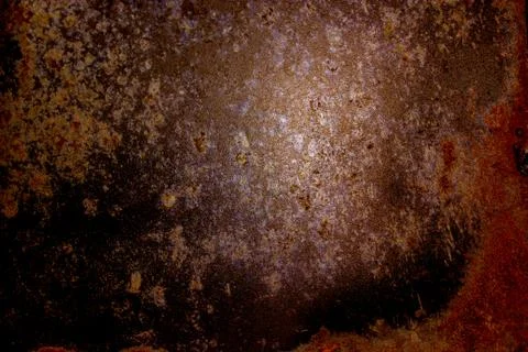 Dark old scary rusty rough golden and copper metal surface texture/background Stock Photos