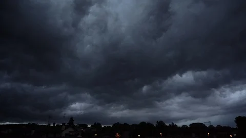 Dark ominous grey storm clouds. Dramatic sky. lighting in dark stormy clouds Stock Footage 112032248