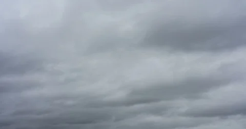 Dark ominous grey storm clouds. Dramatic sky. Storm rain clouds. Stock Footage 120299142