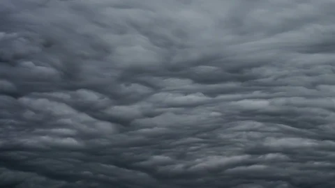 Dark ominous grey storm clouds. Dramatic sky. Storm rain clouds. 動画素材 126282188