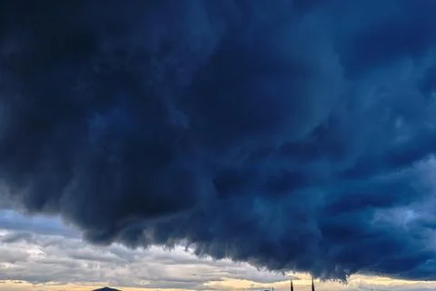 Dark ominous grey storm clouds. Stock Illustration
