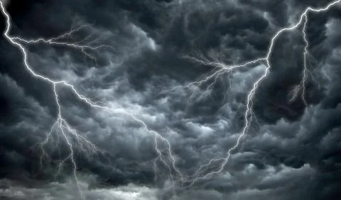 Dark, ominous rain clouds and lightning Stock Photos