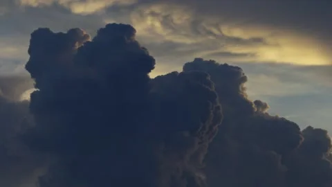 Dark ominous storm clouds forming at sunset Stock Footage 343909213